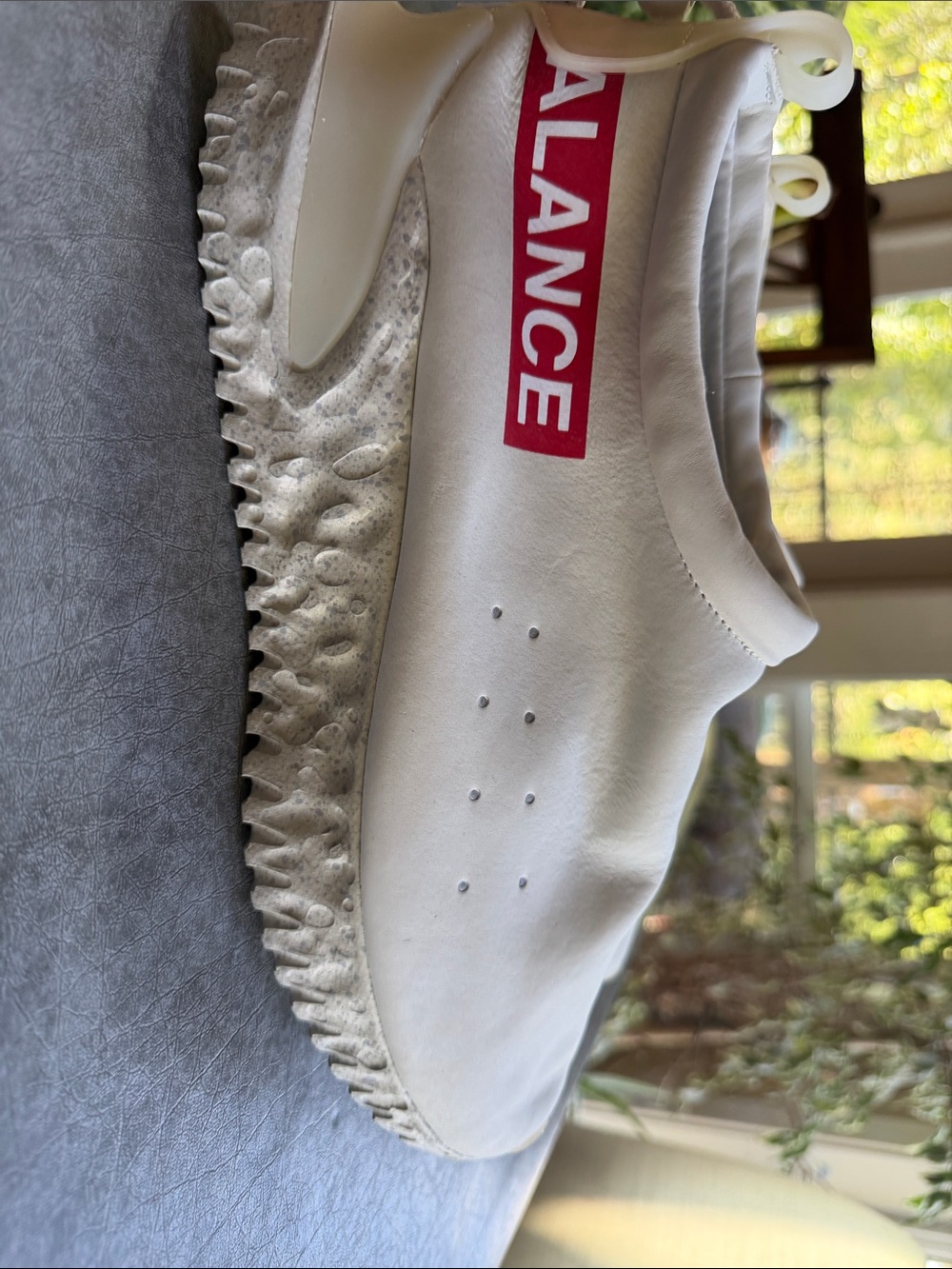 Nike White Slip-On Sneaker with Red Accent